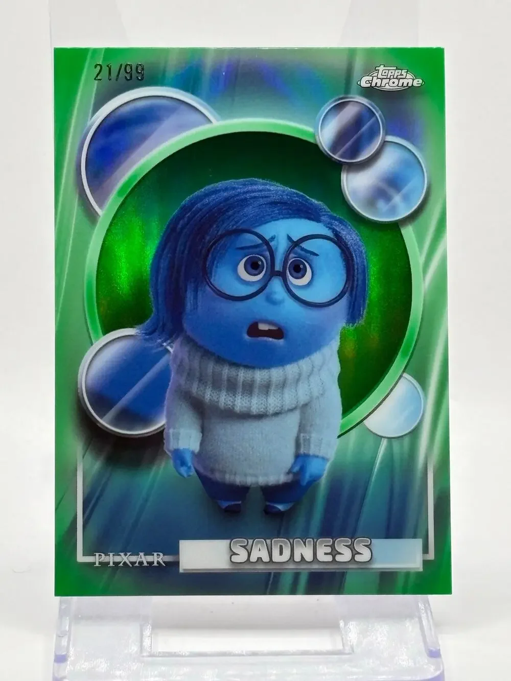 2026 Topps Chrome Disney Sadness Green Refractor 21/99 SP Pixar Inside-Out